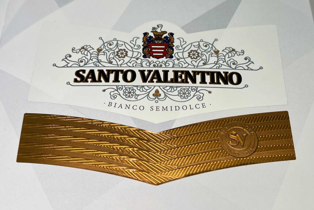 santo etiketka
